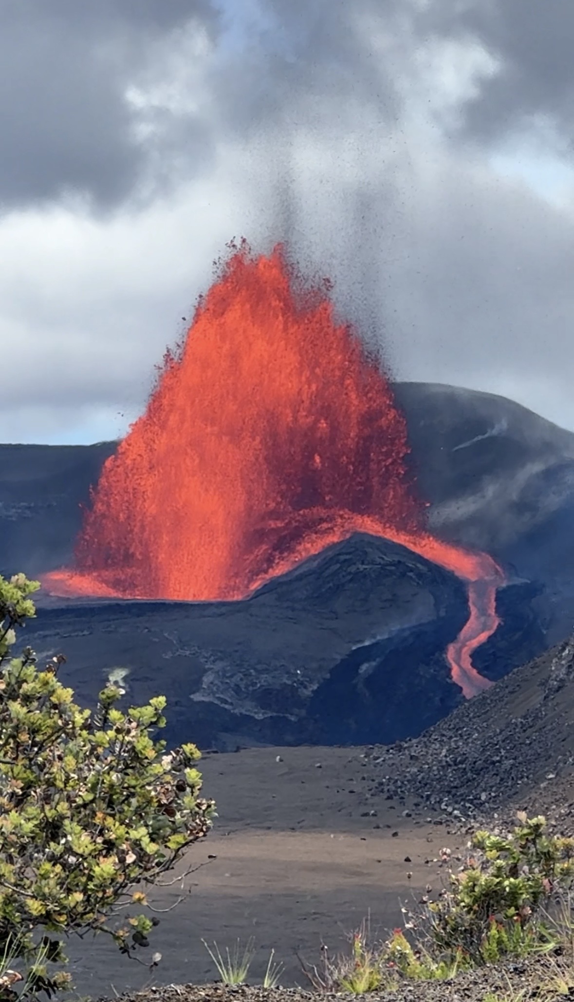 Rafael’s Episode 51 photograph showing a Kīlauea lava fountain feeding a glowing lava river down the side of the cone